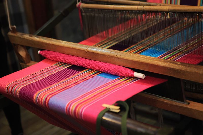 loom, textile, focus on foreground, commercial street, manufacturing equipment, 5K, musical equipment, musical instrument, indoors, factory, industry