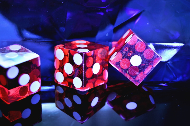 transparent, casino, red, tour, reflection, indoors, no people, table, close-up, opportunity, pattern, cube, dice, focus on foreground, leisure games, still life