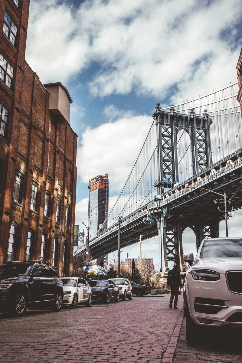 incidental people, connection, coupe, automobile, white, sedan, roadway, cloud - sky, city, traditional design, vehicle, nature, land vehicle, town, outdoors