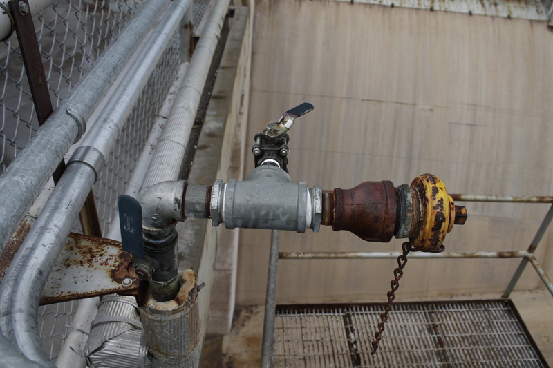 outdoors, landmark, technology, pipe, dam, canyon, mountain, pipe - tube, black, construction, water pipe, building exterior, valve, tourism, travel, machinery