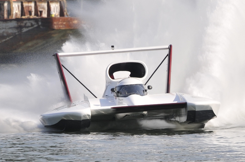 river, occupation, day, sitting, motion, activity, sea, motorboat, speed, water, racing, unrecognizable person, nature, people, nautical vessel, race, travel