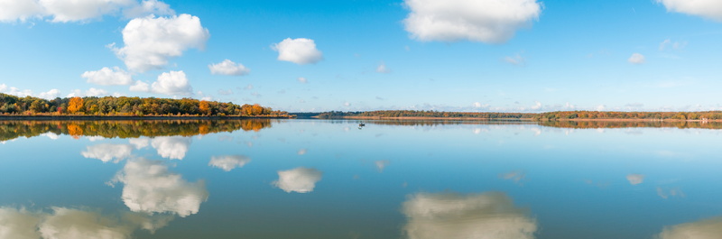 large water surface, tree, day, color, mirror, blue, tranquil scene, no people, of course, perfect mirroring, fischer, beauty in nature, gorgeous, fishing boat