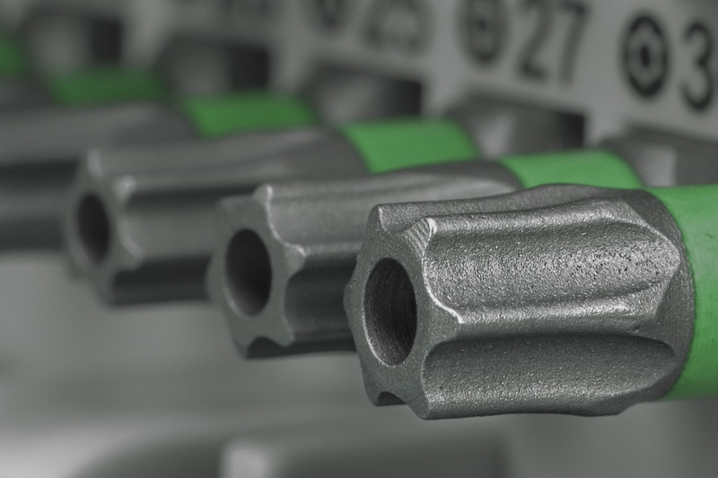 selective focus, bits, faceplate, iron, no people, essay, technology, tool, number, indoors, store, set, craft, business, focus on foreground, social issues