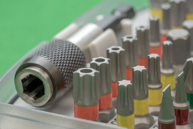 drill, in a row, screwdrivers, green color, technology, torx, equipment, large group of objects, colored background, table, head, work, photography themes