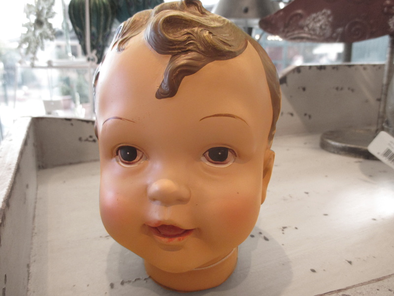 focus on foreground, baby, portrait, representation, old, spare parts, one person, puppendoktor, outdoors, close-up, front view, looking at camera, headshot
