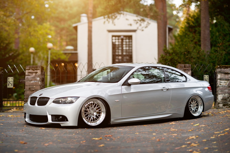 day, street, retro styled, BMW, car, building exterior, silver colored, city, chrome, luxury, outdoors, suspension, coupe, wealth, motor vehicle, no people