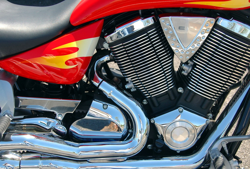 vehicle part, shiny, motor, headlight, bike, classic, wheel, land vehicle, power, metal, metallic, day, machine, transport, vehicle, technology, stationary