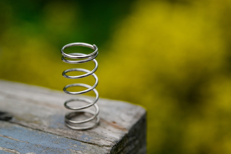mechanics, wood - material, selective focus, focus on foreground, flexible, still life, industrial, land, no people, table, device, spring, solid, brown