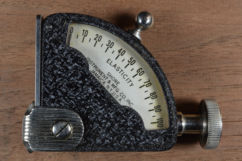 text, vintage, mechanism, indoors, communication, 5K, old, close-up, food and drink, western script, old-fashioned, retro styled, metal, food, personal accessory