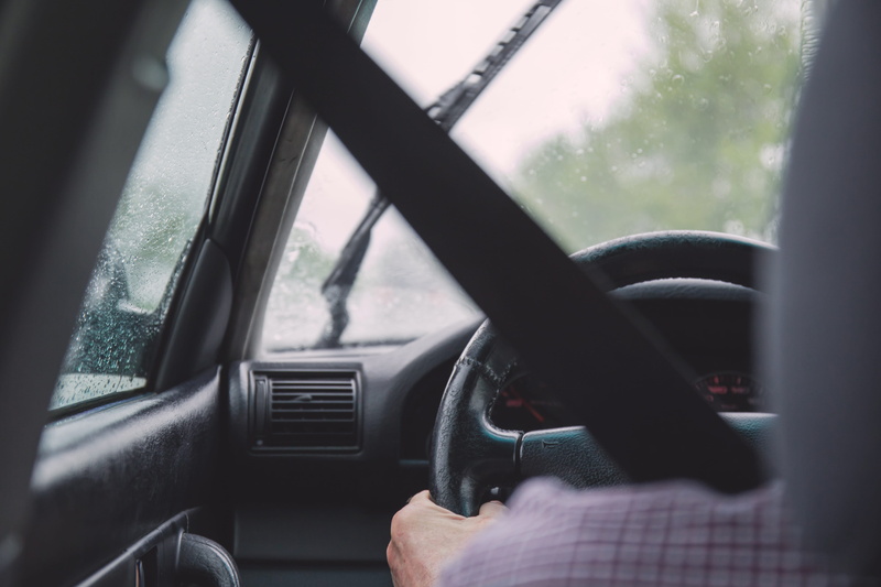 driver, rainy season, speedometer, inside, motor vehicle, lifestyles, land vehicle, human body part, seat belt, seat, water, vehicle interior, transportation system