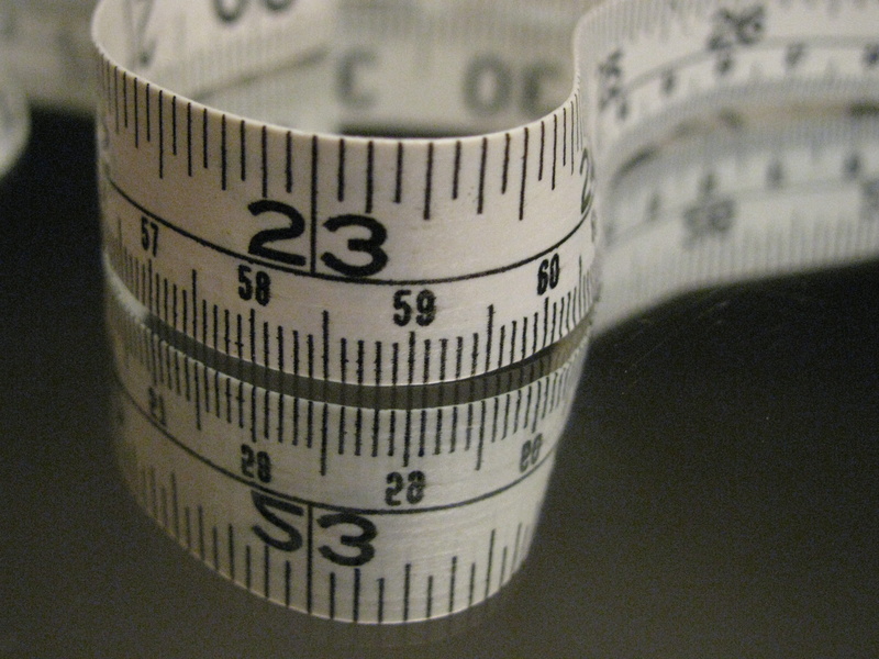 indoors, healthcare and medicine, table, communication, tape measure, ruler, high angle view, rolled up, still life, sewing, measurement, close-up, number