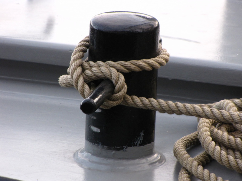 day, cleat, moored, no people, tied knot, water, sailboat, outdoors, mooring rope, durability, nature, bollard, mode of transportation, boat, strength