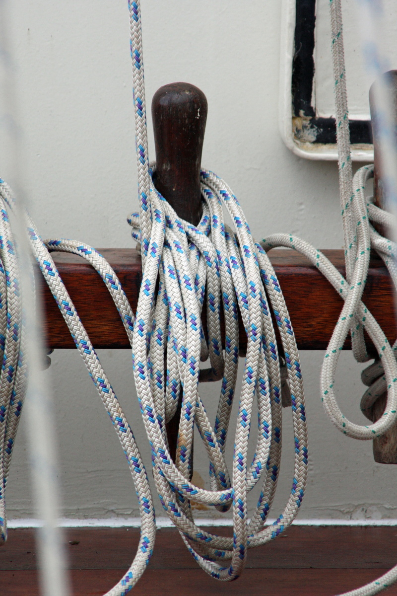 no people, dew, investors, blue, tied up, outdoors, strength, ship accessories, railing, transportation, shipping, knot, fixing, pulley, close-up, festival