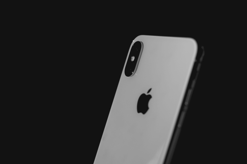 arts culture and entertainment, studio shot, indoors, silver, black background, copy space, luck, camera, focus, apple, still life, opportunity, communication