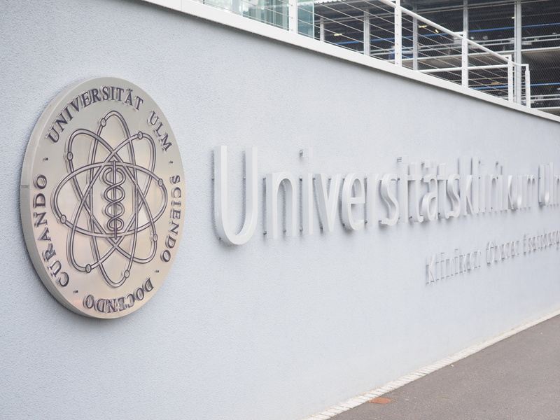4K, script, craft, figurative mark, western script, clock, gray, universitätsklinikum ulm, communication, built structure, wall - building feature, art and craft