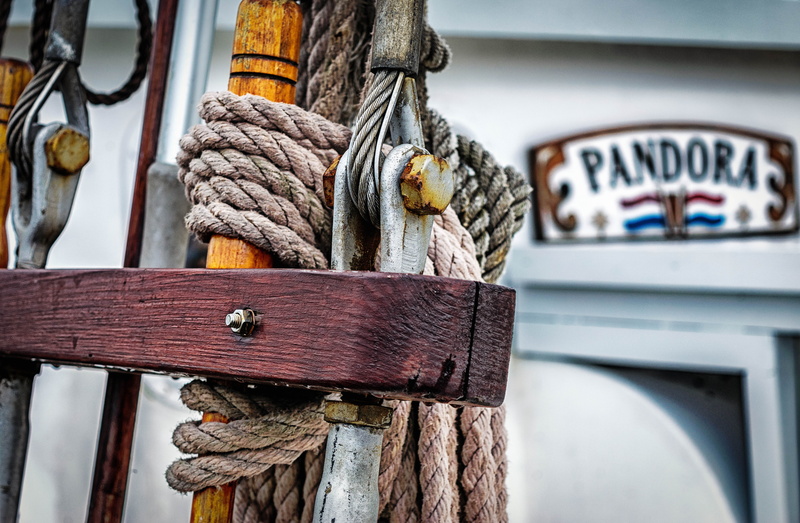 sailing vessel, cordage, ship traffic jams, focus on foreground, nautical vessel, day, sailboat, connection, outdoors, mode of transportation, close-up