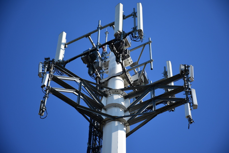 wireless, antenna, clear sky, cellular tower, power, no people, radio, blue, steel, low angle view, sky, recording studio, black, architecture, tower, electrical equipment