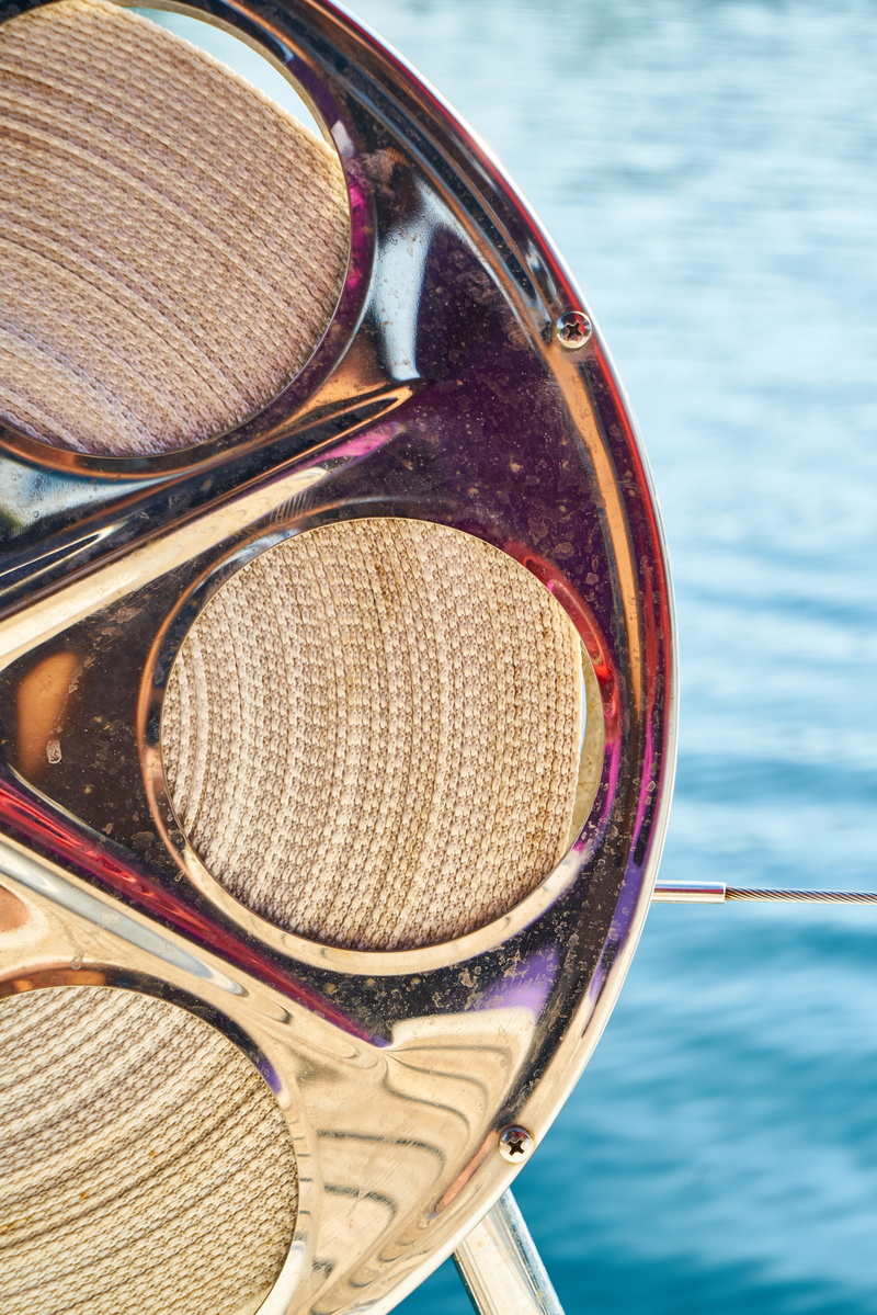 water, close-up, pulley, outdoors, high angle view, musical instrument, reflection, background, circle, 5K, thick, no people, arts culture and entertainment