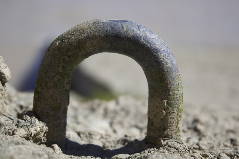 weathered, water, wharf, day, ring, port, wheel, concrete, no people, selective focus, anchor, shape, focus on foreground, land, old, flowing water, rusty