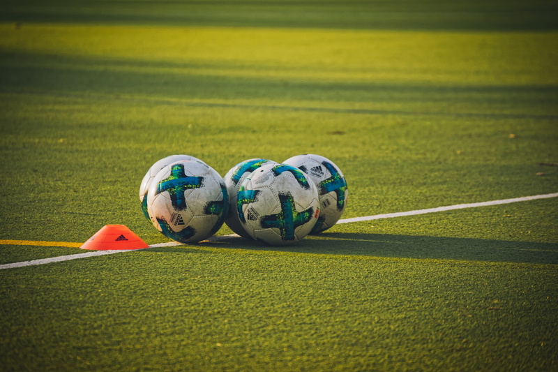 selective focus, no people, day, football, grass, sport, still life, creativity, adidas, football pitch, close-up, artificial turf, soccer, 5K, lines