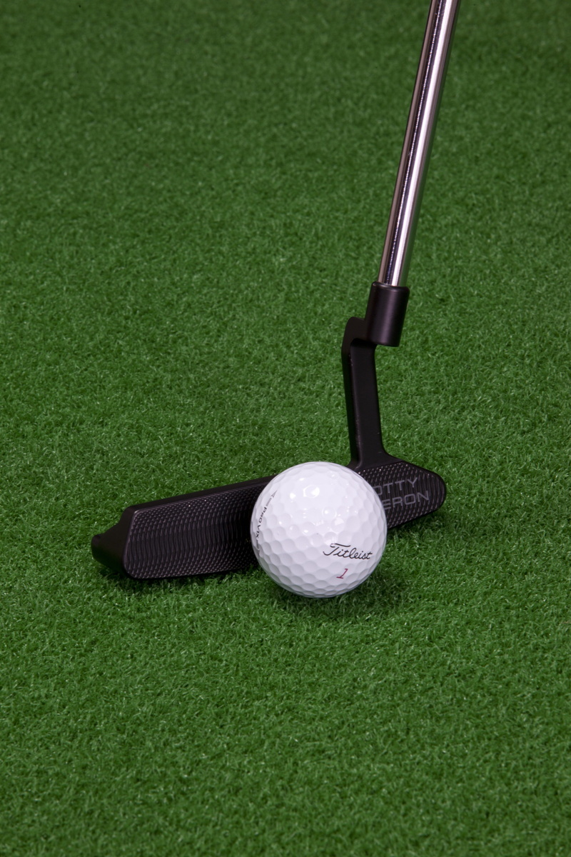 golf clubs, activity, leisure activity, golf club, high angle view, artificial turf, leisure, grass, close-up, golf balls, golf course, exercise, driver - golf club