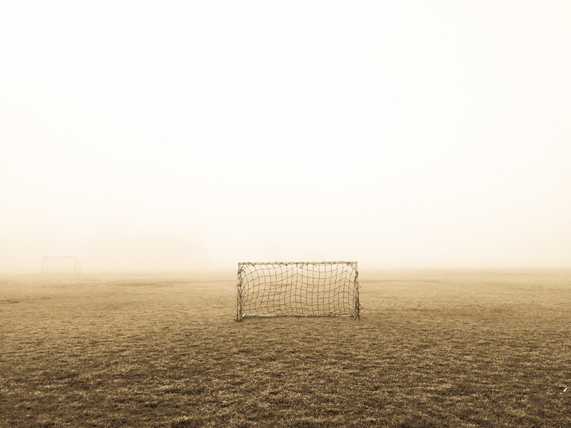 nature, alone, absence, outdoors, no people, environment, tranquility, landscape, beauty in nature, football, fog, gates, sky, copy space, lawn, scenics - nature