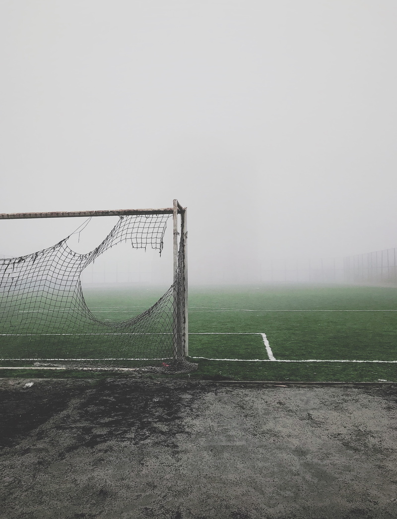 absence, sports equipment, grey, decay, sport, land, tranquility, no people, team sport, playground, grass, net - sports equipment, goal post, outdoors