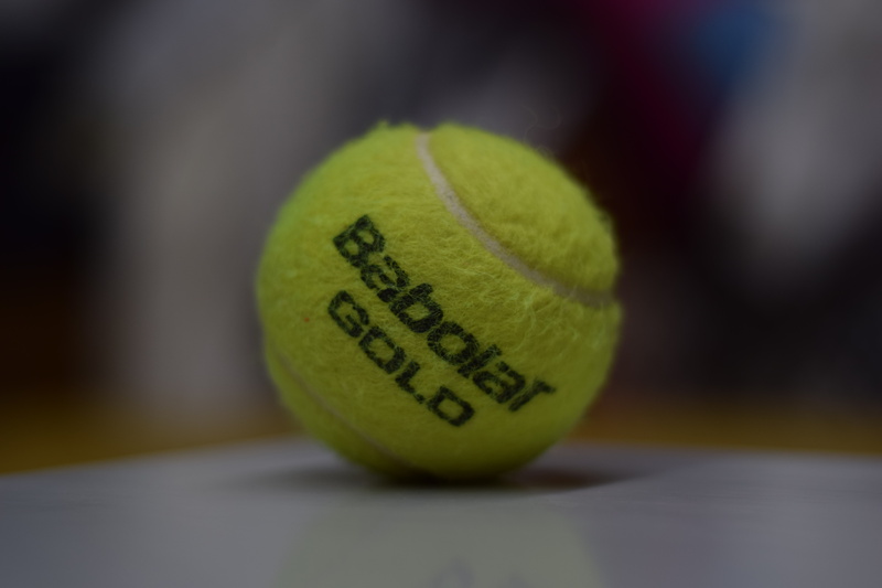 ball, tennis, absence, 5K, single object, still life, close-up, number, tennis balls, competition, focus on foreground, yellow, sphere, indoors, selective focus