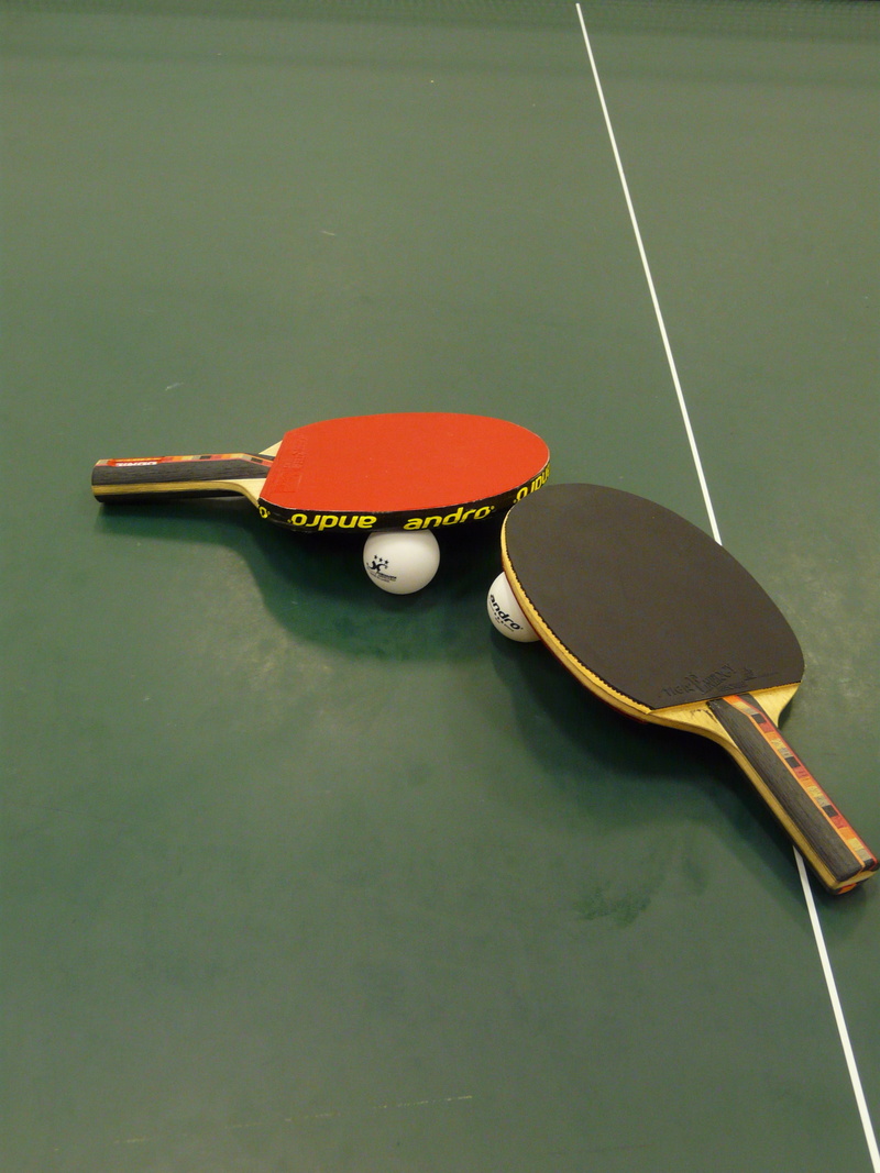 equipment, indoors, absence, sports equipment, table tennis bat, table tennis, sport, play, bat, still life, green color, ball, leisure activity, three objects