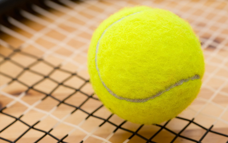 tennis racket, court, competitive Sport, hobbies, sports Equipment, outdoors, two objects, recreational Pursuit, yellow, equipment, single Object, competition