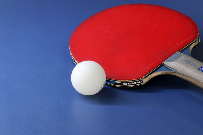 racket sport, colored background, ball, leisure activity, blue background, high angle view, olympic, ping-pong ball, close-up, still life, activities, ping pong