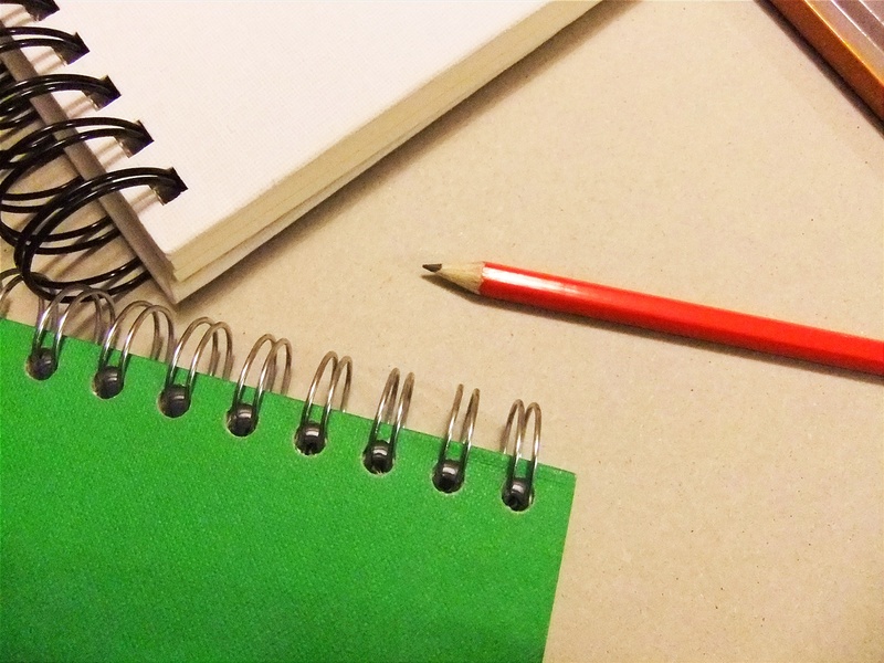 note pad, office, high angle view, publication, green color, book, page, pencil, close-up, table, ring binder, spiral notebook, red, indoors, paper, portfolio