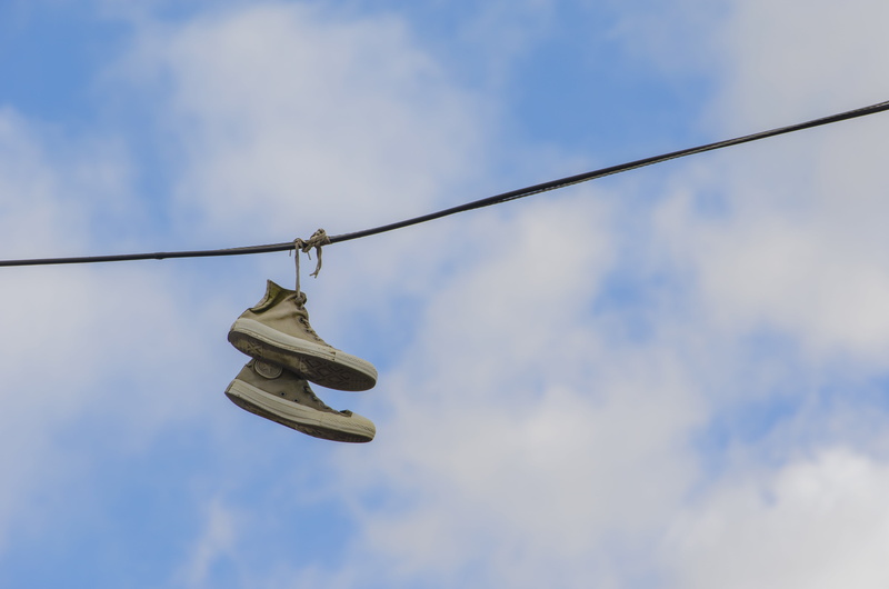 connection, equipment, telephone wire, laundry, phone cord, clothespin, rope, day, converse, outdoors, low angle view, shoe, clothesline, boots, no people