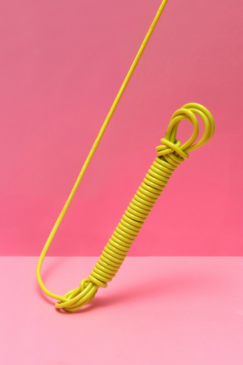 two objects, pink background, single object, tangled, background, cut out, landline phone, connection, green color, electrical, yellow, 5K, indoors, cord