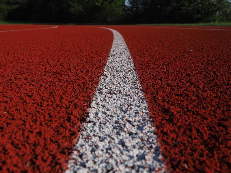 race, tartan, backgrounds, athletics, no people, asphalt, runway, round, photo, run, stadium, brown, selective focus, stripes, in a row, surface level