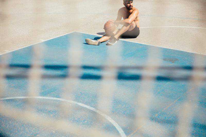 healthy lifestyle, youth, sit, day, sunlight, basketball net, full length, One Person, Sport, 2K, city, Athletic, ball, bearded, vitality, leisure, young adult