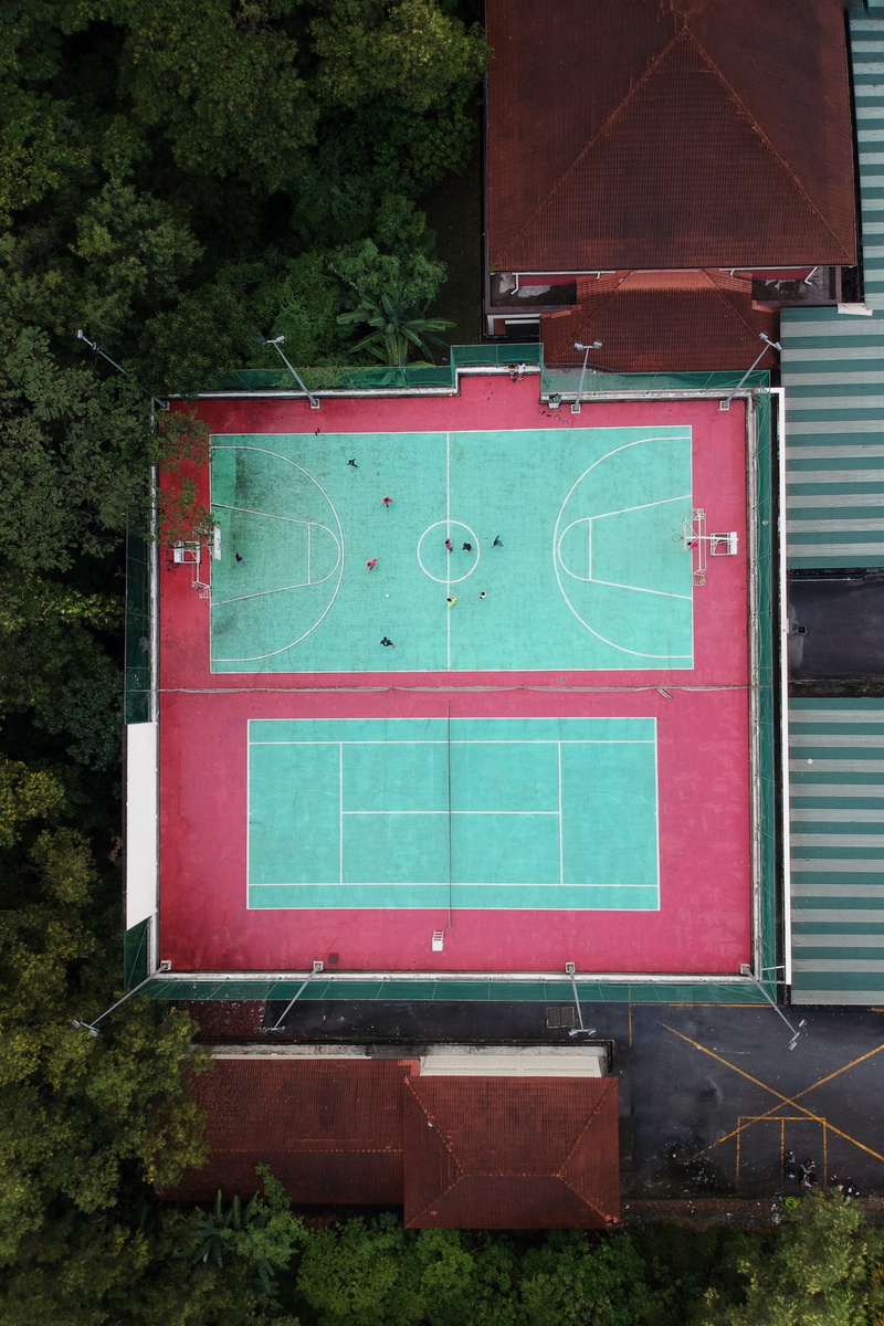 outdoors, ballpark, brick, plant, city, court, communication, drone, sport, forest, tennis, red, building, photography, brick wall, day, metal, building exterior