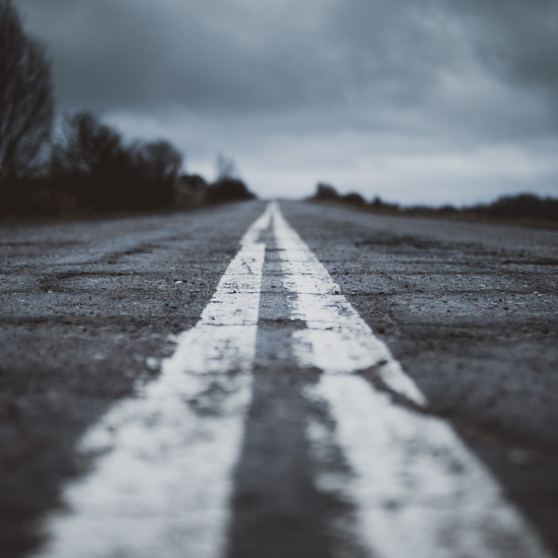 day, surface level, direction, selective focus, nature, paint line, vanishing point, outdoors, diminishing perspective, marking, sign, gray, line, no people