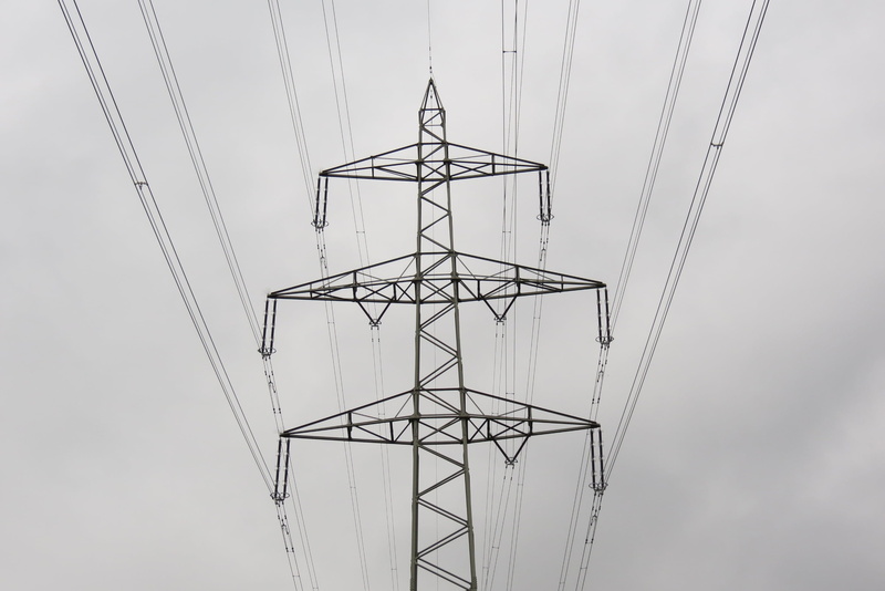 generation, cable, post, grey, generator, symmetry, silhouette, energy, tower, electrical component, directly below, power, day, built structure, pole