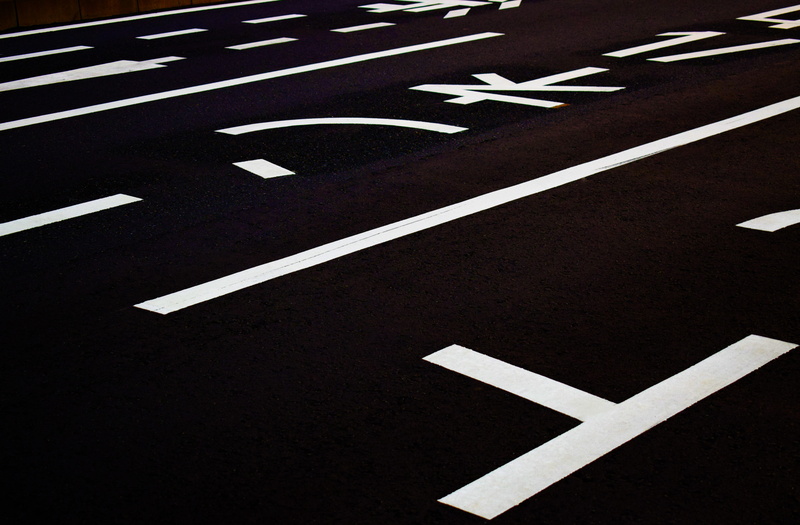dividing Line, lane, street, speed, striped, urban Scene, car park, arrow Symbol, line, traffic, highway, black and white, outdoors, asphalt, parking lot