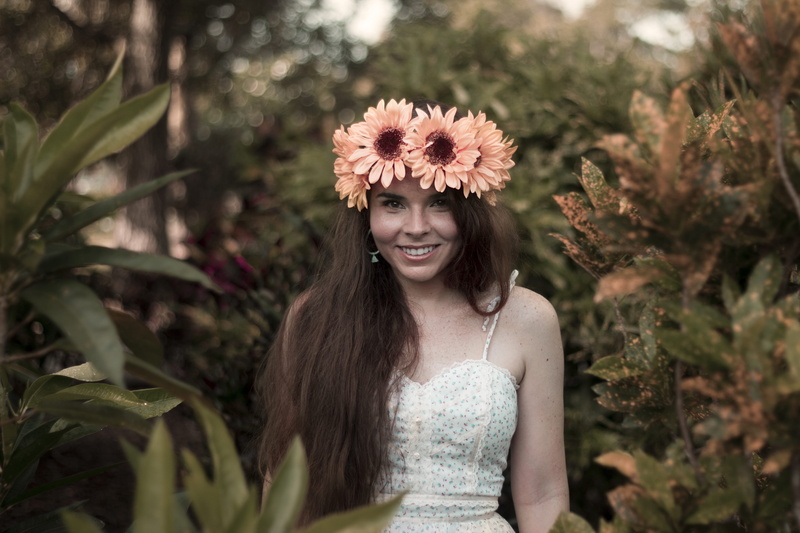person, 5K, plant, smiling, fashion, tiara, teenager, human, flowering plant, casual clothing, beautiful woman, nature, young women, waist up, lakes park
