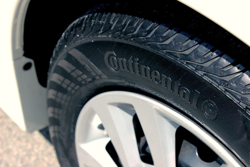 no people, rubber, car, wealth, continental, close-up, focus on foreground, land vehicle, motor vehicle, sports car, radial, silver, stationary, outdoors