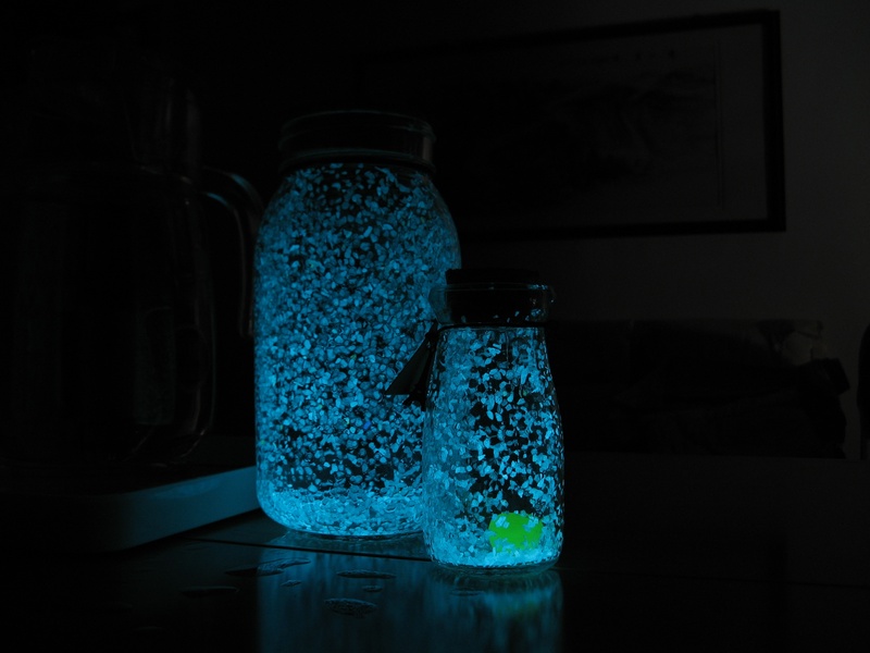 container, gift, nature, indoors, table, green color, close-up, glass - material, reflection, bottle, blue, studio shot, bottles, night, 2K, noctilucent