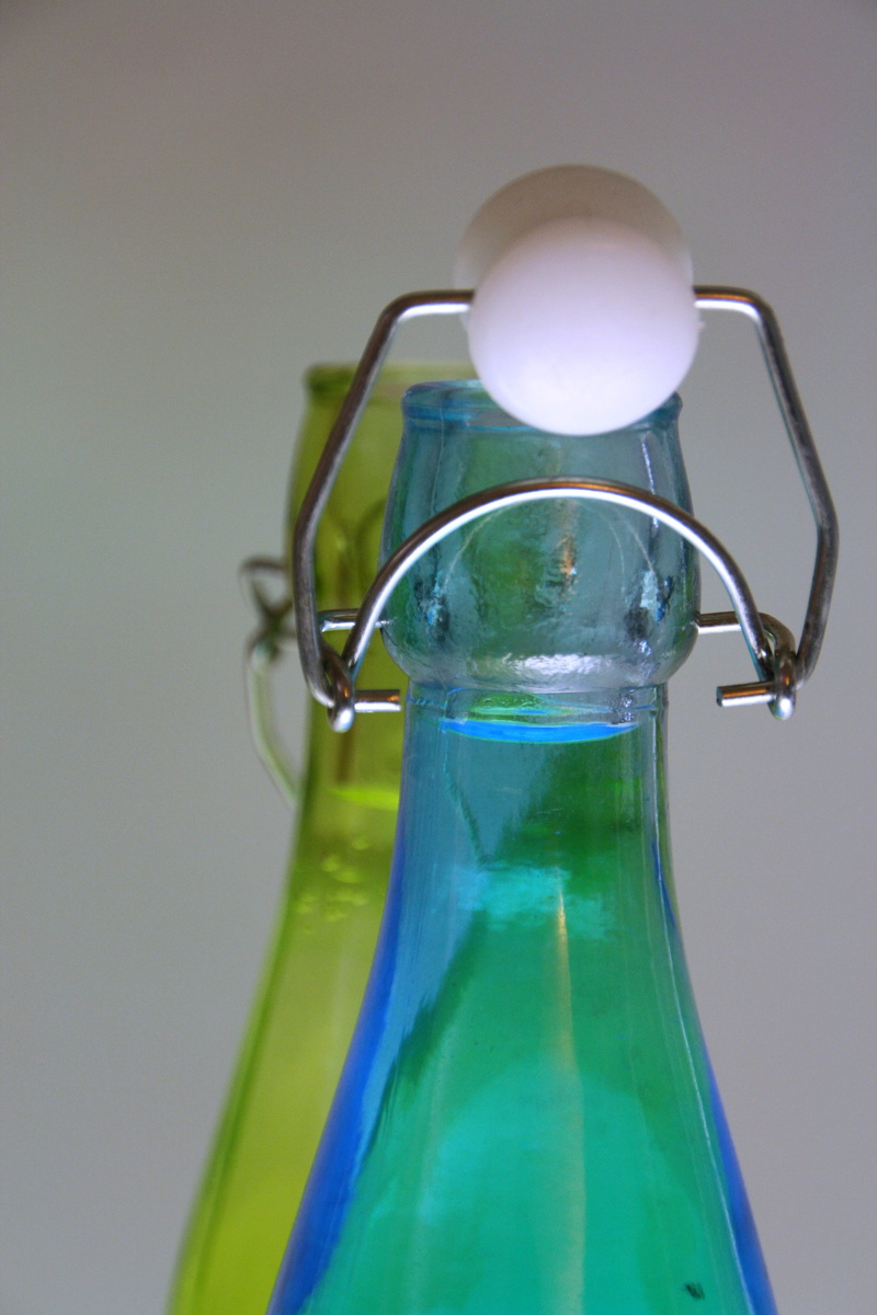 still life, studio shot, glass - material, turquoise colored, illuminated, no people, research, blue, 4K, indoors, colored background, two empty bottles