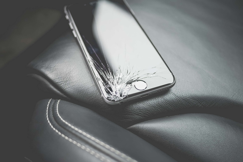 finger, one animal, black and white, reflection, luxury, real people, brand, human body part, leather, silver colored, unrecognizable person, technology