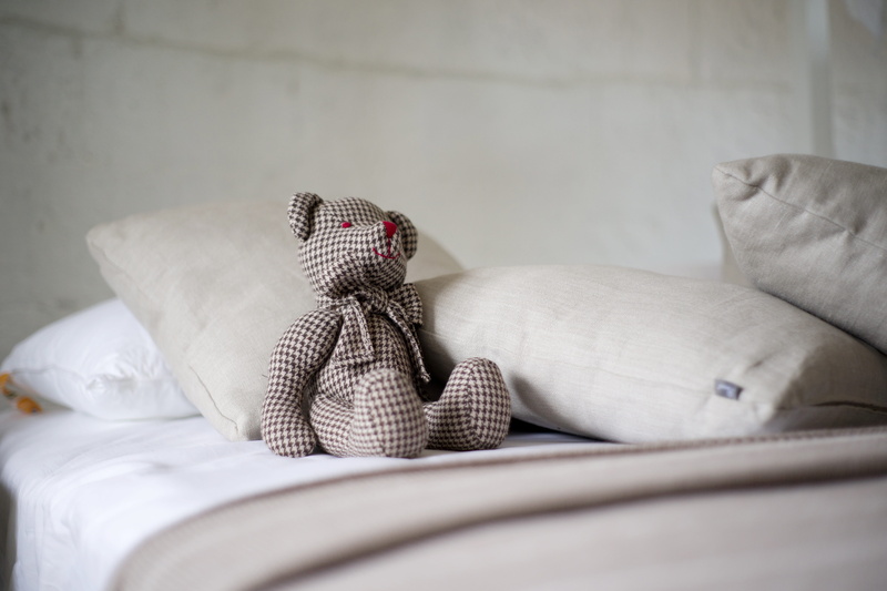 domestic room, relaxation, white color, bedroom s, absence, no people, pillows, beside, beautiful, home interior, linen, bed, indoors, day, plush, Bear
