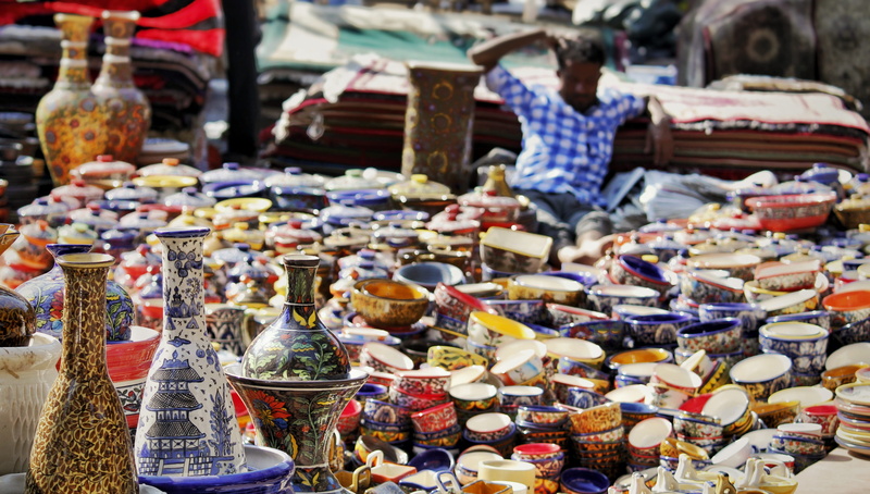 incidental people, selling, consumerism, retail, collection, handcrafts, choice, arrangement, food, outdoors, buying, 4K, for sale, selective focus, focus on foreground