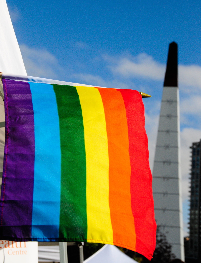 built structure, canada, 2K, low angle view, flag pole, focus on foreground, urban, sky, pride day, symbol, patriotism, no people, pride, lgbtqia, outdoors