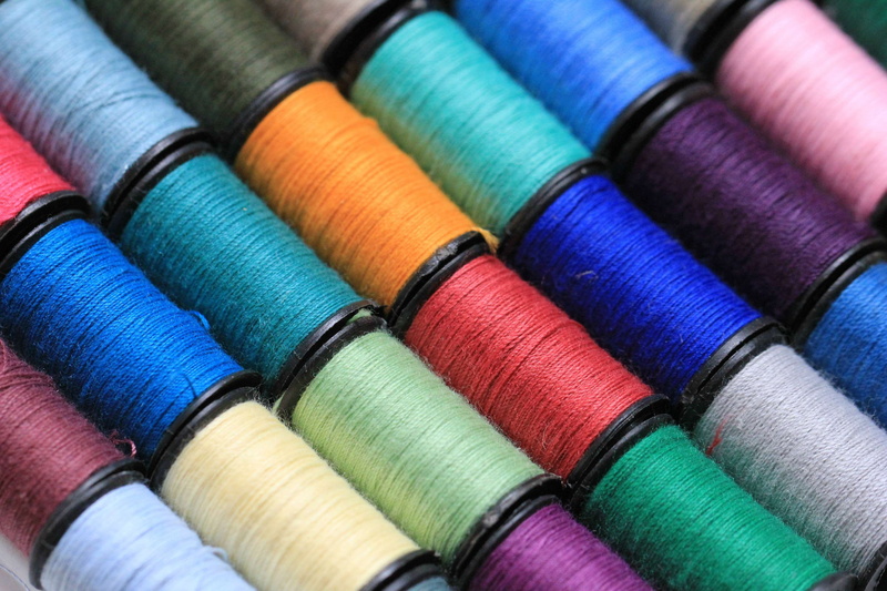 textile industry, creativity, thread, indoors, large group of objects, backgrounds, needlework, selective focus, 2K, homemade, vibrant color, group of objects