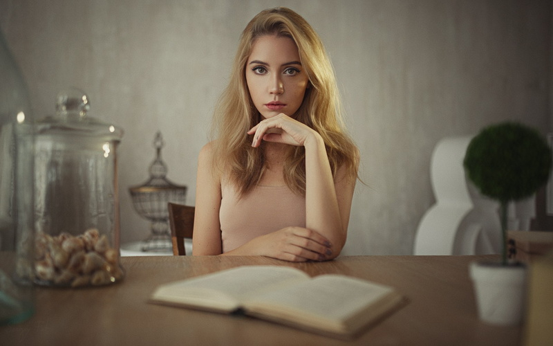 beautiful woman, portrait, teenager, sitting, young adult, beauty, indoors, hair, table, contemplation, adult, blond hair, blonde, looking at camera, beautiful people